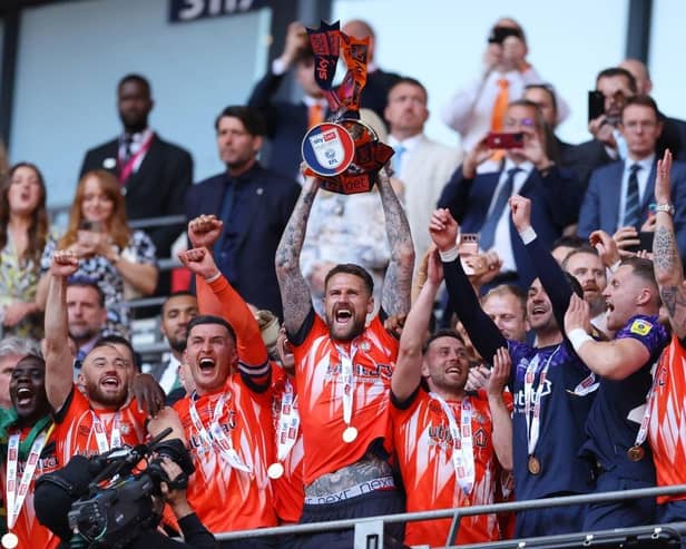 Luton celebrate winning promotion to the Premier League