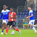 Chiedozie Ogbene makes a pass during Luton's 3-2 win over Gillingham in midweek - pic: Liam Smith