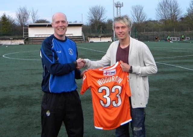 Cauley Woodrow is presented with his Luton short by Town's former head of the academy Gregg Broughton back in 2010