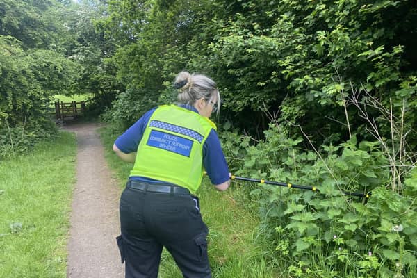 Officer on a knife sweep near Wigmore. Picture: Olivia Preston