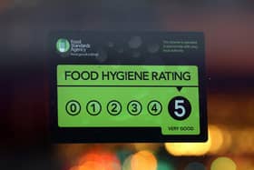 LONDON, ENGLAND - FEBRUARY 09: A Food Standards Agency rating certificate is pictured in the window of a restaurant on February 9, 2015 in London, England. Claims have been made that some restaurants are ignoring food hygiene standards ratings. (Photo by Carl Court/Getty Images)