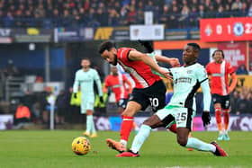 Town attacker Andros Townsend looks to get away from Chelsea midfielder Moises Caicedo - pic: Liam Smith