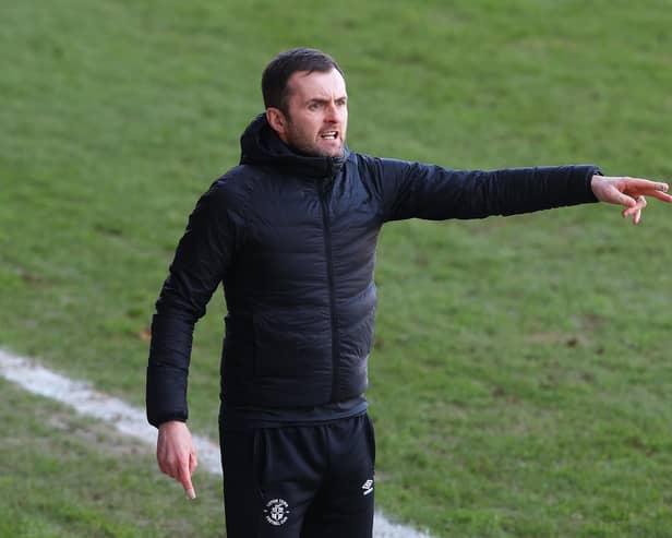 Nathan Jones, manager of Luton Town, gives their team instructions during the Sky Bet Championship match between Luton Town and Sheffield Wednesday at Kenilworth Road on February 27, 2021.