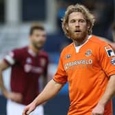 Craig Mackail-Smith in action for the Hatters