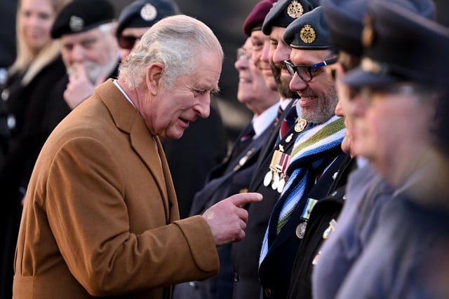 King Charles checks out the medals on this proud veteran's chest (Photo by Leon Neal/Getty Images)