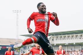 Luton midfielder Shandon Baptiste celebrates his last-minute winner against Coventry - pic: Duncan Jack / PRiME Media Images