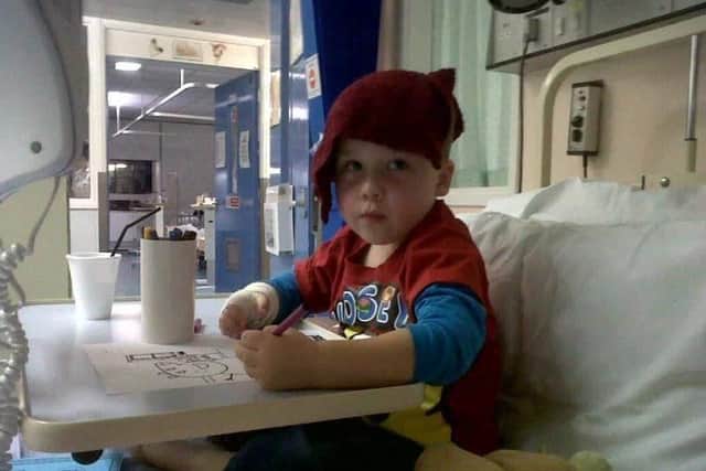 Rhys Kiernan aged 4, receives treatment in hospital for a brain tumour
