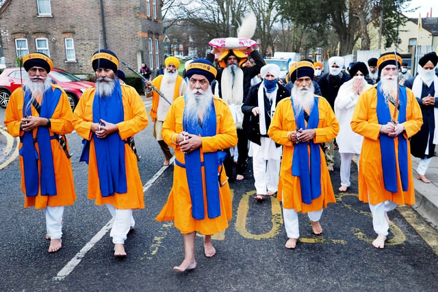 Luton Sikhs take their Holy Book from the old Gurdwara to the new Gurdwara as they opened it in 2022.