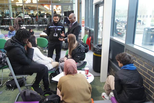 Montell Neufville and Bedfordshire Police officer engaging with students. Picture: Montell Neufville