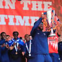 Fred Onyedinma celebrates with the Championship play-off winners' trophy