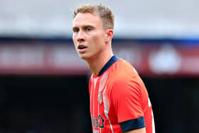Cauley Woodrow will wear the Luton Town number 10 shirt this season