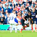 Pelly Ruddock Mpanzu comes away with the ball against Spurs on Saturday - pic: Liam Smith