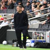 Hatters boss Jack Wilshere watches on against MK Dons - pic: Jane Russell