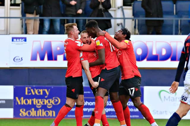 Allan Campbell celebrates his wonder strike against WBA last season