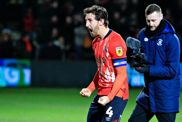 Tom Lockyer celebrates Tuesday night's 1-0 win over Cardiff City