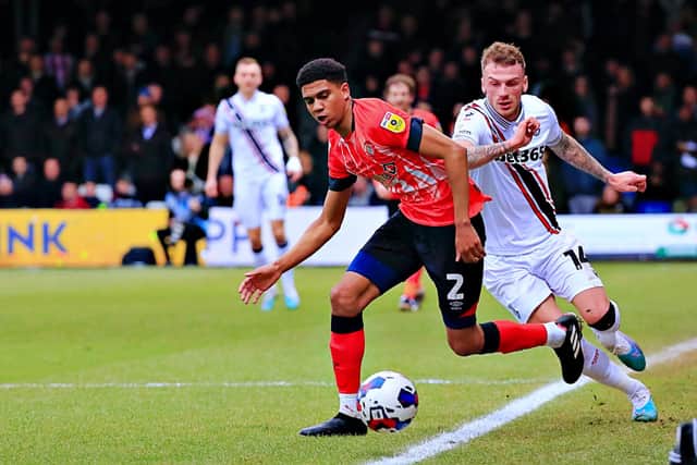 Cody Drameh on the ball for Luton at the weekend