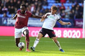 Dion Charles looks to make a challenge for Bolton against Northampton Town - pic: Pete Norton/Getty Images