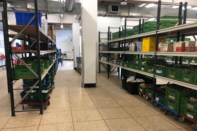 A view of the neatly stacked shelves in Dunstable Foodbank's new premises. COM Church helped with the tidying up and decorating to make the area suitable for food storage