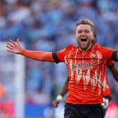Luke Berry celebrates winning promotion to the Premier League at Wembley