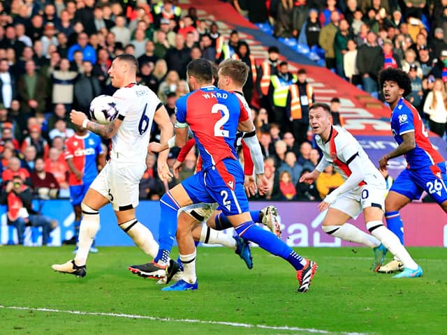 Cauley Woodrow heads home to rescue a point for the Hatters at Crystal Palace - pic: Liam Smith