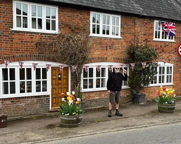John outside the former Post Office in the village. Picture: John Hanna
