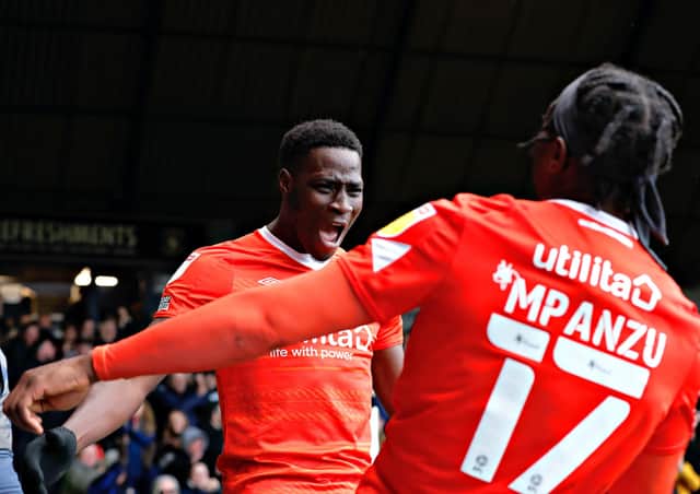 Luton forward Elijah Adebayo celebrates his goal against Millwall on Saturday