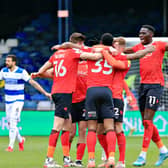 Luton celebrate Cameron Jerome's opener against QPR last season