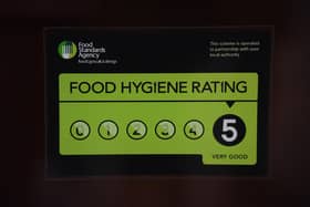 A Food Standards Agency rating sticker on a window