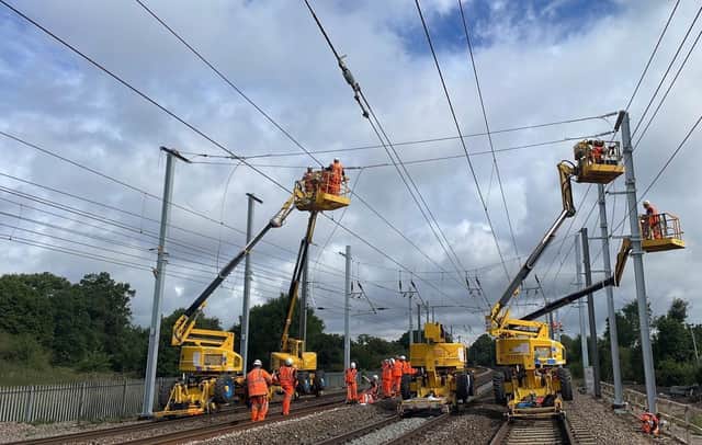 Engineers installing overhead lines as part of the Midland Mainline Upgrade. Picture: Network Rail