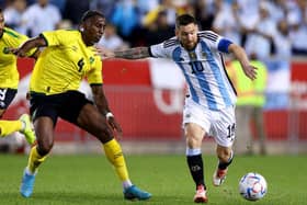 Luton defender Amari'i Bell in action for Jamaica against Argentina's Lionel Messi