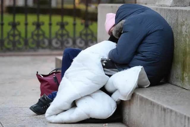 Homeless people sleeping on the plinth of the Ferdinand Foch equestrian statue in Victoria, London. Picture: Nicholas.T. Ansell via PA