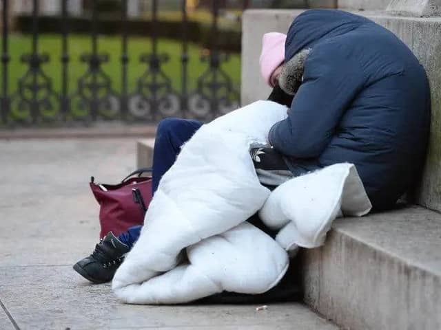 Homeless people sleeping on the plinth of the Ferdinand Foch equestrian statue in Victoria, London. Picture: Nicholas.T. Ansell via PA