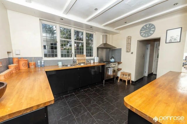 The generous sized kitchen is located adjacent to the dining room and has large amounts of natural light