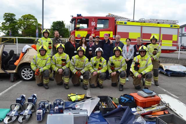 Firefighters, college staff and the volunteer students