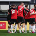 Stoppage time joy: Callum Marshall celebrates his winner - pic: David Horn