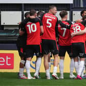 Stoppage time joy: Callum Marshall celebrates his winner - pic: David Horn