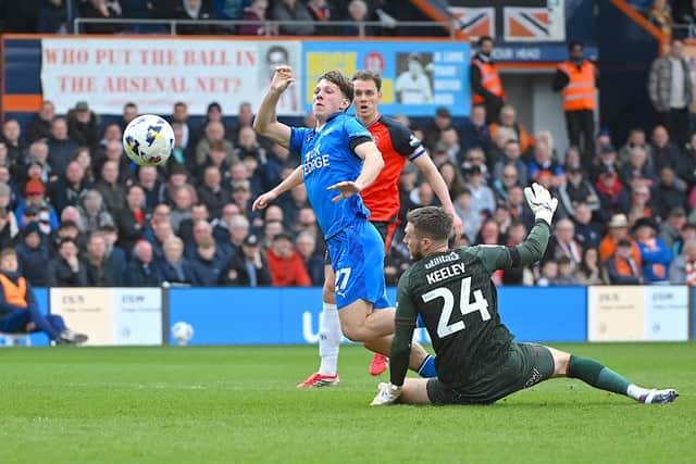Josh Keeley is deemed guilty to have tripped Peterborough's Harry Leonard on Good Friday - pic: Andy Fitzsimons