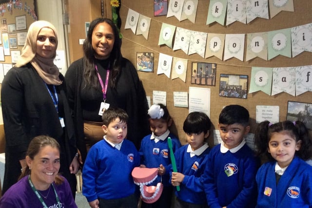 Children with staff from the school, Luton Council and the Dental Wellness Trust