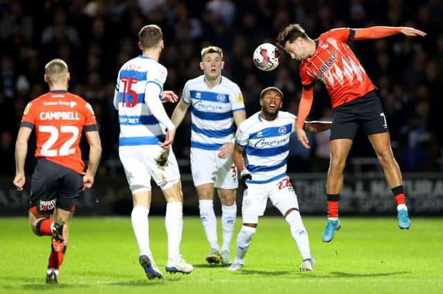 Harry Cornick wins a header during this evening's 3-0 win at QPR - pic: Getty Images