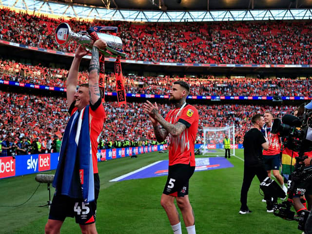 Sonny Bradley applauds the Hatters fans at Wembley