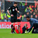 Pelly Ruddock Mpanzu receives treatment during Luton's 1-1 draw with Nottingham Forest - pic: Liam Smith
