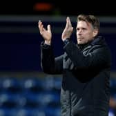 Rob Edwards applauds the Luton fans after beating QPR 3-0 on Thursday night