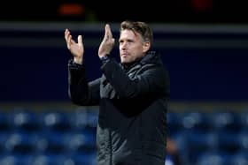 Rob Edwards applauds the Luton fans after beating QPR 3-0 on Thursday night