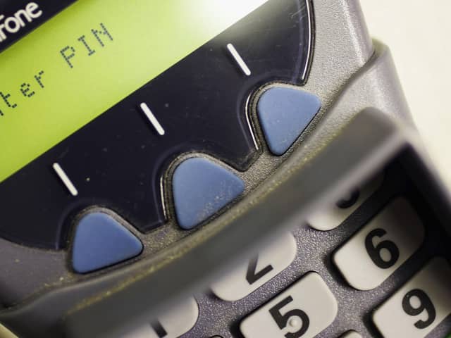 A chip and pin debit console. Photo Illustration  by Christopher Furlong/Getty Images