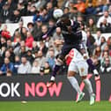 Hakeem Odoffin gets up to head the ball away - pic: Jane Russell