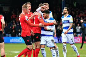 Luton's players surround QPR's Ilias Chair after he shoved Tom Lockyer to the ground at half time during last season's 2-1 defeat