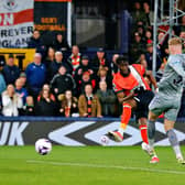 Elijah Adebayo draws the Hatters level against Everton this evening - pic: Liam Smith