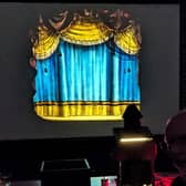 Kevin Varty's magic lantern show in the blacked-out church hall.
