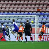 Thelo Aasgaard scores a brilliant opener for Wigan on Tuesday night
