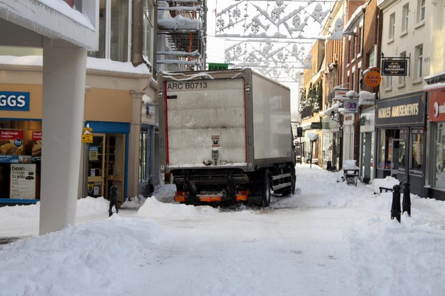 Delivery driver negotiates the wintry weather in Chesterfield town centre in 2010.